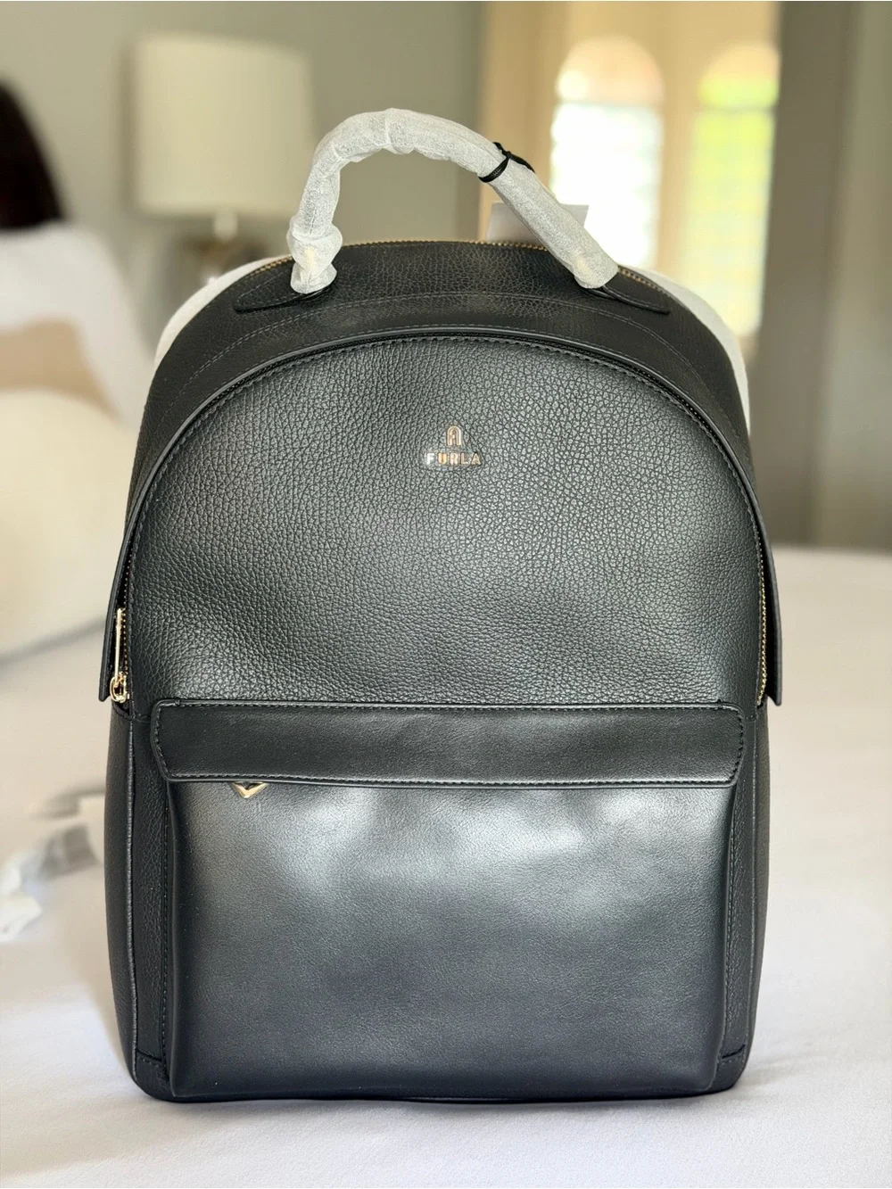 Furla Black Leather Backpack with Gold Logo